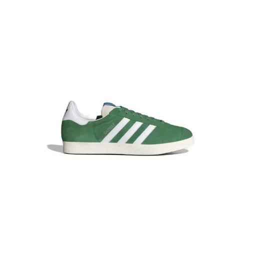 Green Adidas Gazelle sneaker featuring white stripes and sole in Adidas Men Sneakers collection