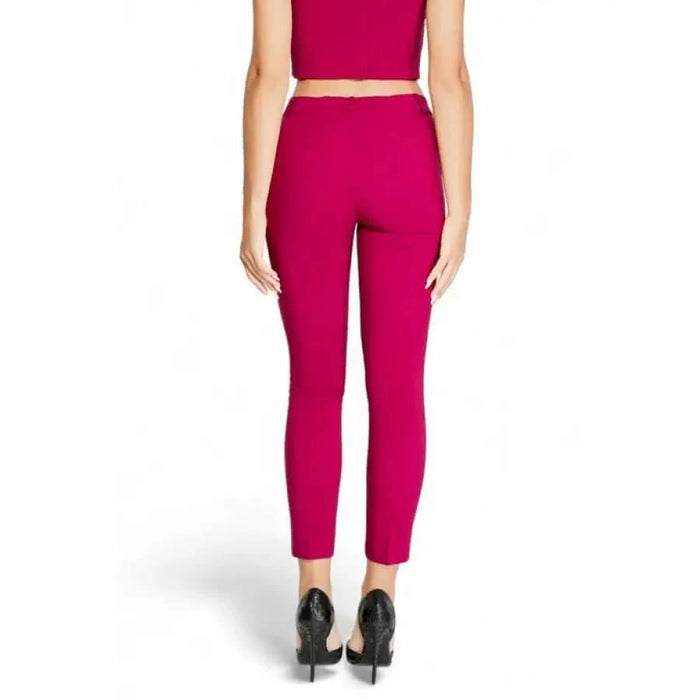 Hot pink cropped dress pants with a slim fit silhouette from Rinascimento Women Trousers