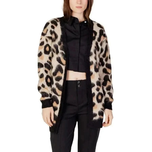 Leopard print cardigan worn over a black top and pants from Jacqueline De Yong Women Cardigan