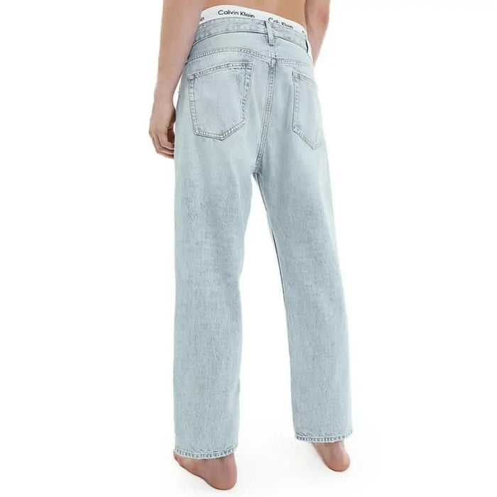 Light blue Calvin Klein jeans featuring a signature waistband for men