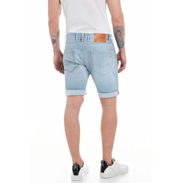 Light blue Replay Men shorts with rolled cuffs and brown leather back patch