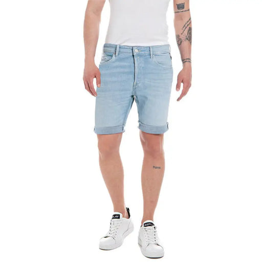 Light blue denim shorts with rolled cuffs from Replay featuring pockets for men