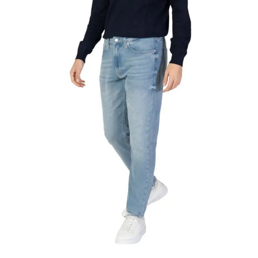 Light blue relaxed-fit Calvin Klein men’s jeans with a straight leg cut for Fall Winter