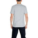 Light gray short-sleeved Calvin Klein men t-shirt modeled from the back