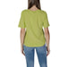 Lime green B.young women’s round neck t-shirt paired with stylish blue jeans