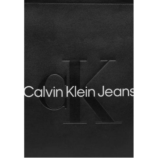 Calvin Klein Jeans logo in white on black, featured on Calvin Klein Women Bag