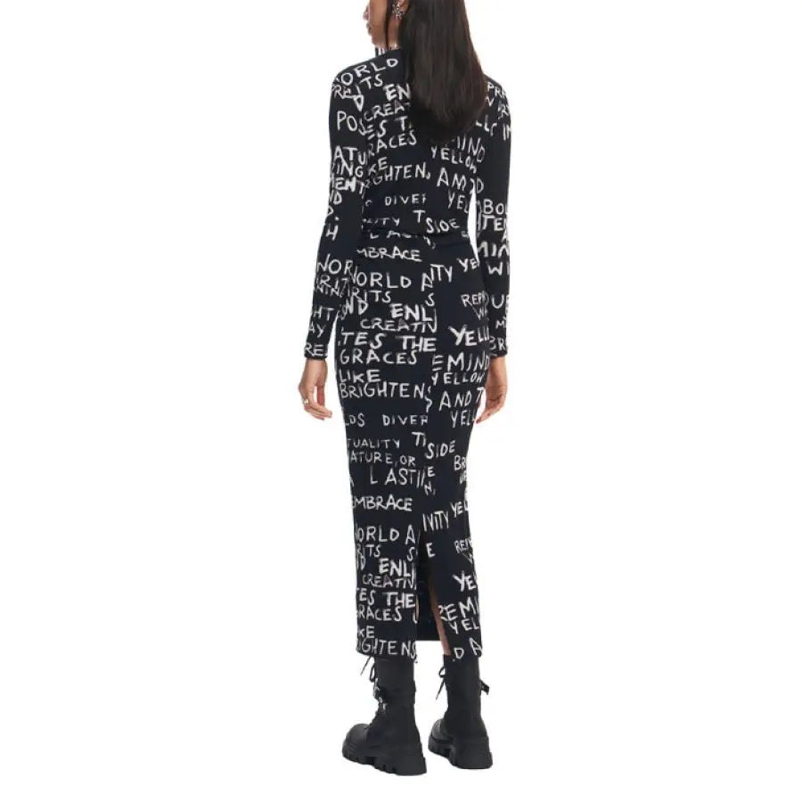 Desigual Women’s Dress - Long-sleeved black graffiti dress paired with chunky black boots