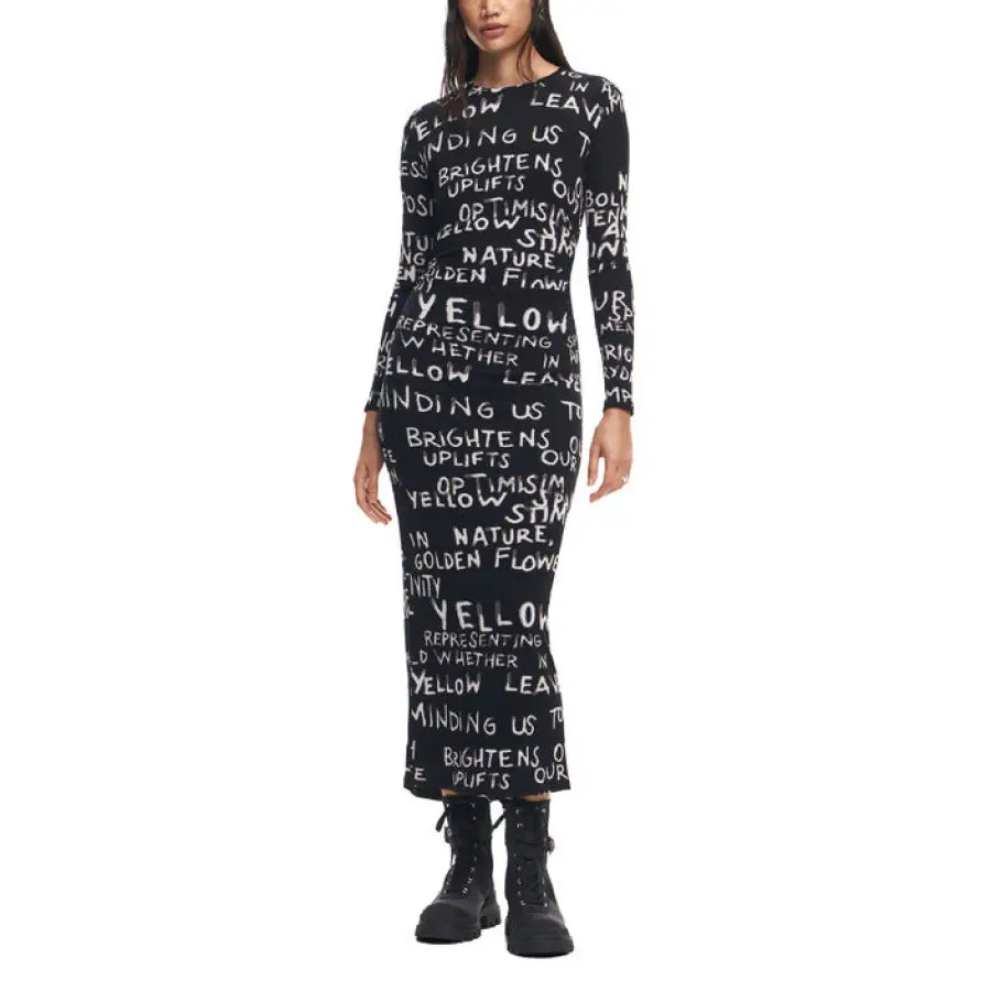 Desigual Women’s long-sleeved black dress with white text print over the entire garment