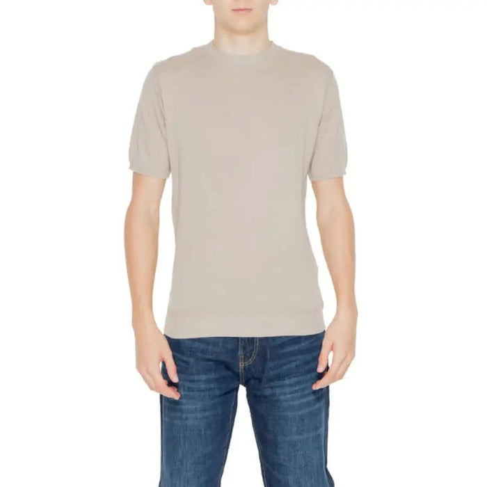 Man in beige t-shirt from Hamaki-ho Men Knitwear collection