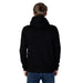 Man in Icon urban style clothing hoodie, back facing camera, symbolizing urban city fashion