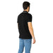 Man in black polo shirt and blue jeans showcasing Armani Exchange Men Polo from behind