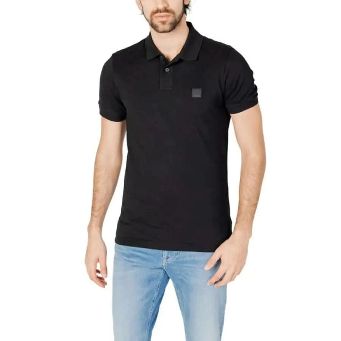 Boss Men Polo - Spring Summer Product featuring man in black polo shirt, boss gender specific.