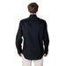 Alviero Martini Prima Classe men’s shirt - man in black shirt and white pants