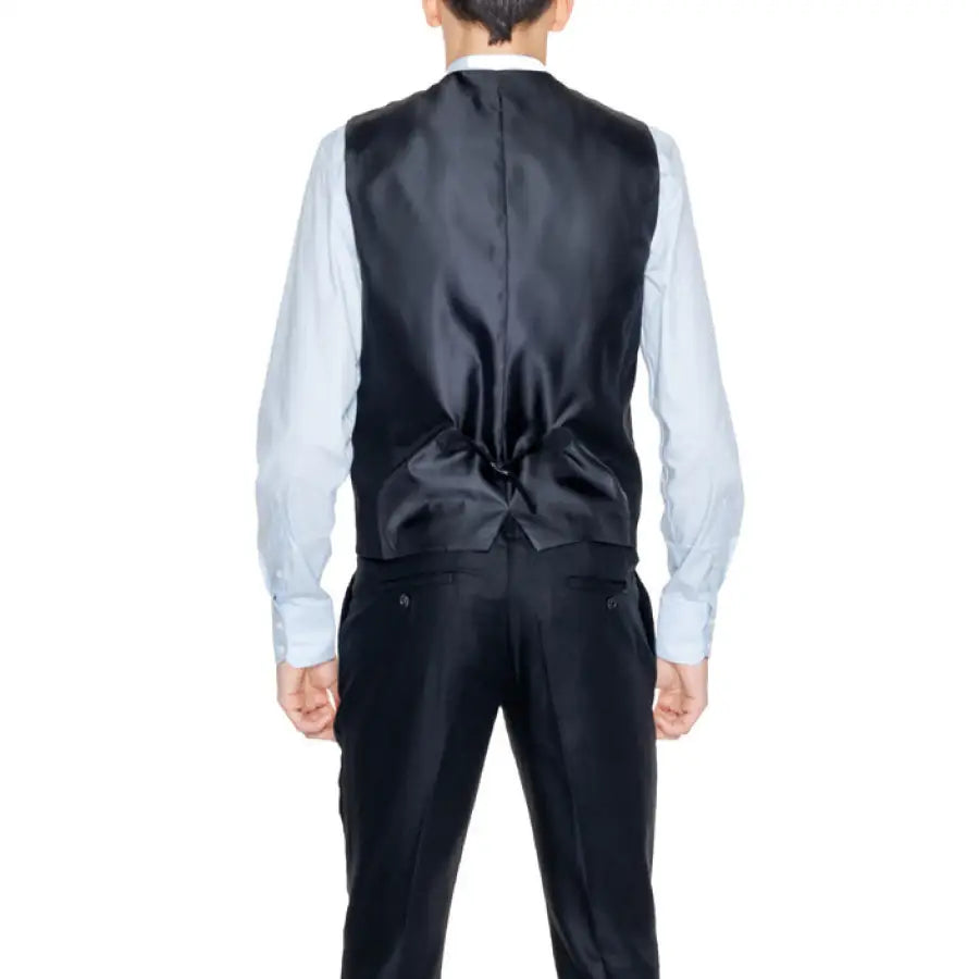 Man wearing a black suit and tie showcasing Antony Morato Men Gilet