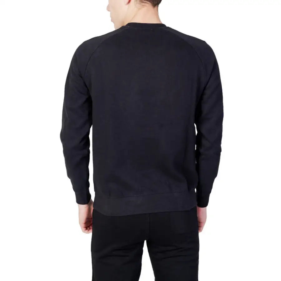 U.s. Polo Assn. Men Knitwear - Man in black sweatshirt and black pants
