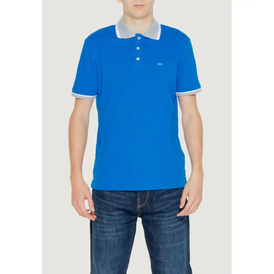 Man wearing a blue polo shirt from Gas - Gas Men Polo collection