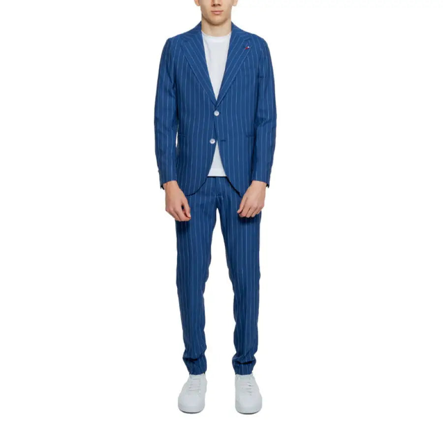 A man in a blue suit and white sneakers from Mulish - Mulish Men Suit collection