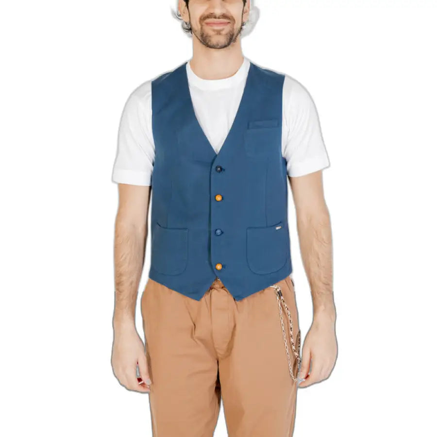 Man in blue vest and tan pants modeling Gianni Lupo - Gianni Lupo Men Gilet
