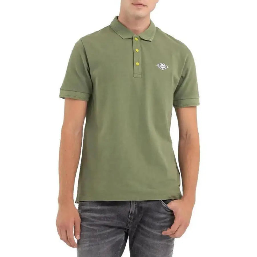 Man wearing green Replay Men Polo shirt from the Replay collection