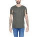 Man wearing green Alviero Martini Prima Classe T-shirt with brown elbow patch