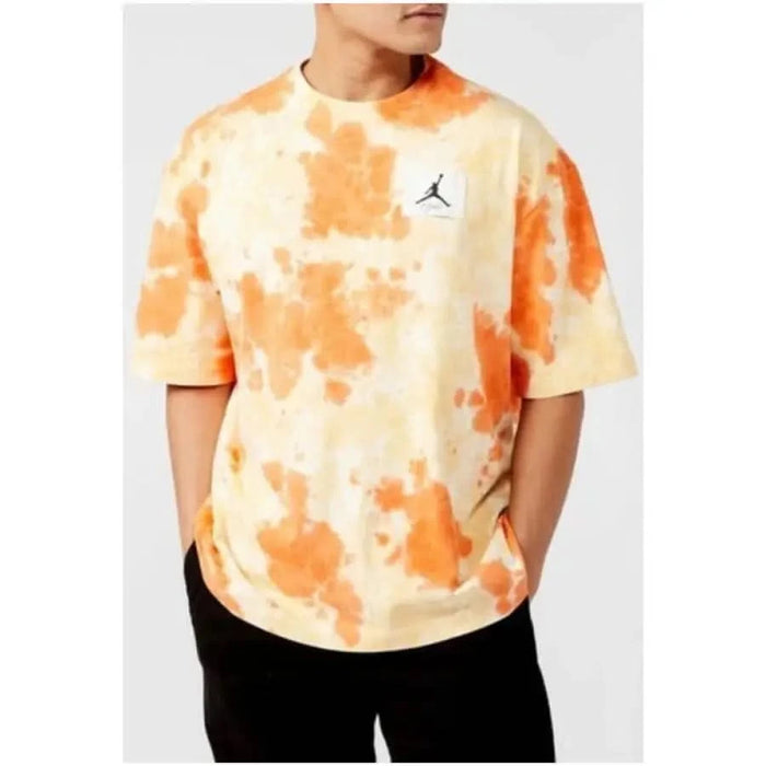 Urban style Jordan Men T-Shirt: orange tie dye with a white chest patch