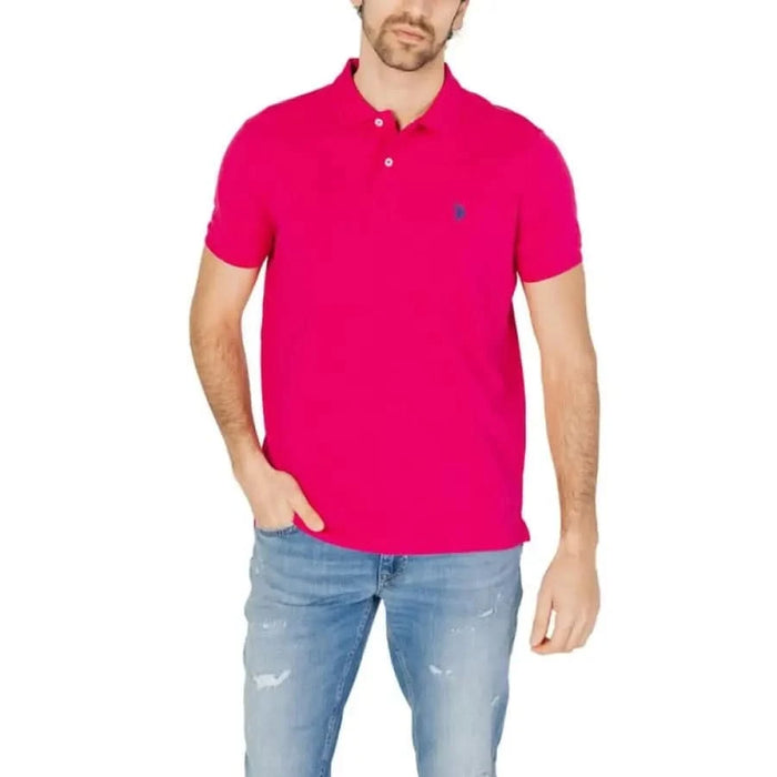 Man in pink U.S. Polo Assn. men polo shirt, apparel accessories.