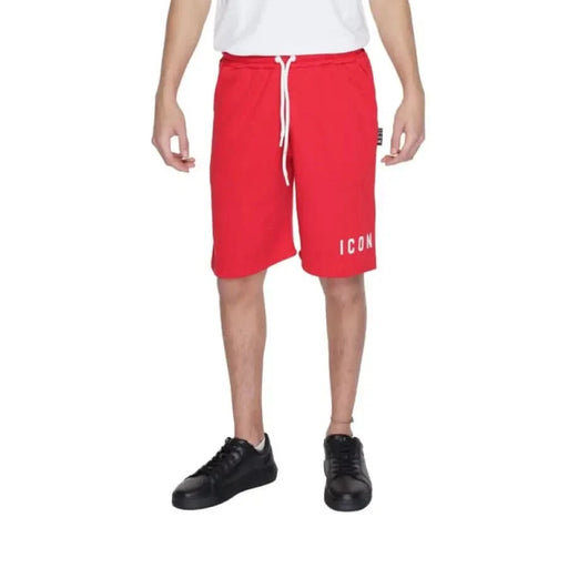 Man in Icon - Icon Men Shorts showcasing urban city style with red shorts and white t-shirt