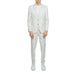 Man in white Mulish Men Suit with matching white shoes