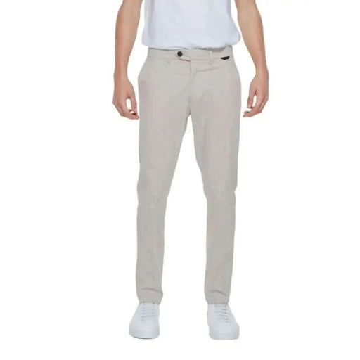 Man in white t-shirt and khaki Antony Morato trousers, casual urban fashion