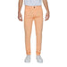 Urban style clothing: Man in white t-shirt and orange Borghese Men Trousers