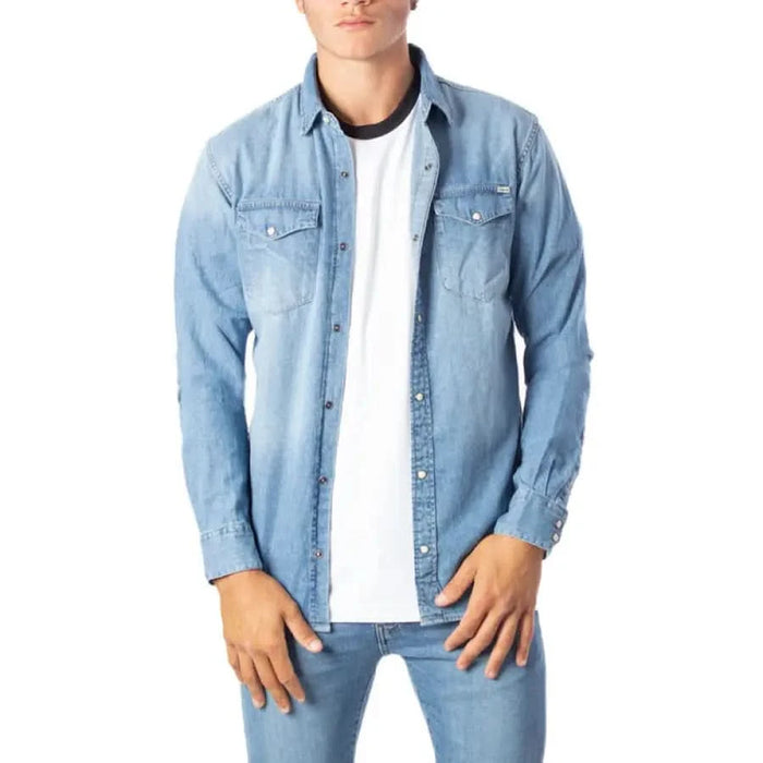 Jack & Jones men shirt modeled by a man in white T-shirt and blue jeans