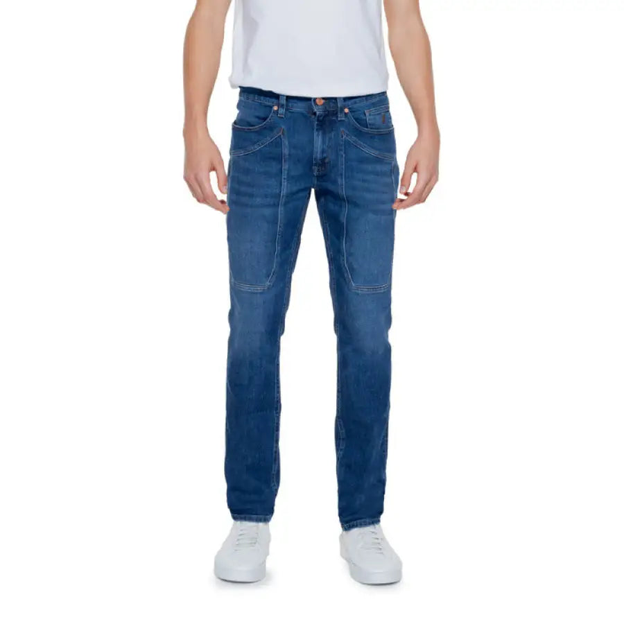 Urban style: A man in a white t-shirt and Jeckerson Men Jeans
