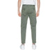 Urban style: man in white t-shirt and khaki Liu Jo Men Trousers