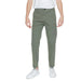 Urban style: Man in white t-shirt & khaki Liu Jo Men Trousers