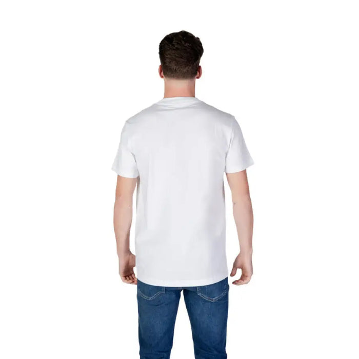 Man in white t-shirt and blue jeans modeling Calvin Klein Jeans Men’s Underwear