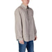 Calvin Klein Jeans Men’s Long Sleeve Button Shirt in Beige displayed on a neutral background