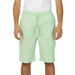 Mint green drawstring shorts worn by a person in a white shirt, Lee - Lee Men Shorts