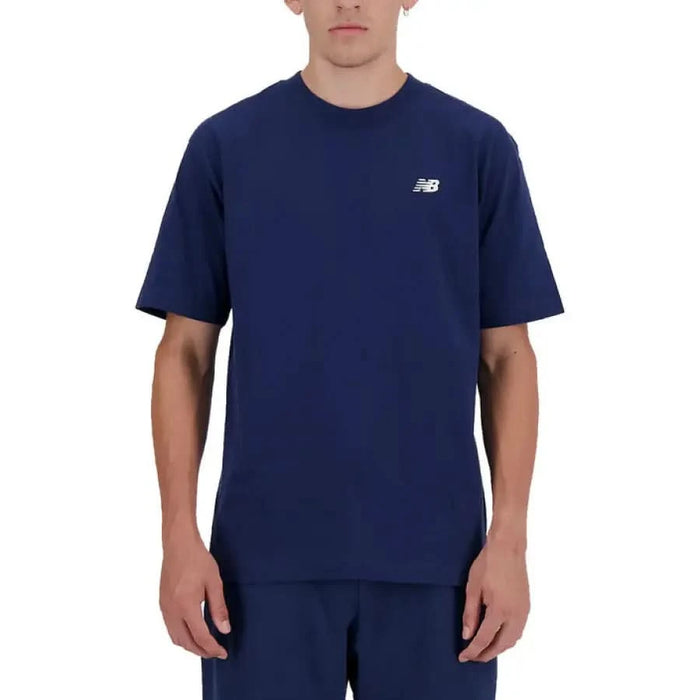 Navy Blue New Balance Men T-Shirt worn by a person; stylish and comfortable activewear