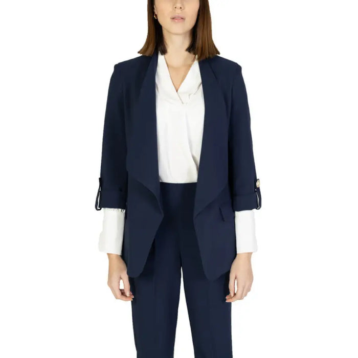 Navy blue blazer with rolled sleeves over a white blouse from Rinascimento Women Blazer