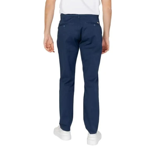 Navy Blue Chino Pants by Armani Exchange on a Person in White Shirt and White Sneakers