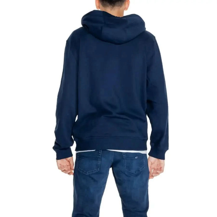 Tommy Hilfiger Men Sweatshirts Navy Blue Hoodie Seen from Behind Worn by Person