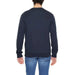 Emporio Armani navy blue long-sleeved crewneck sweatshirt worn by a person in jeans