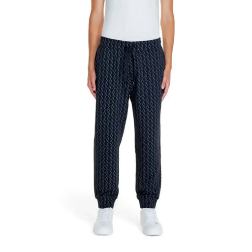 Navy blue patterned jogger pants with elastic cuffs from Armani Exchange Men Trousers collection