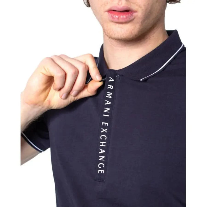 Navy blue Armani Exchange polo shirt featuring vertical logo along placket