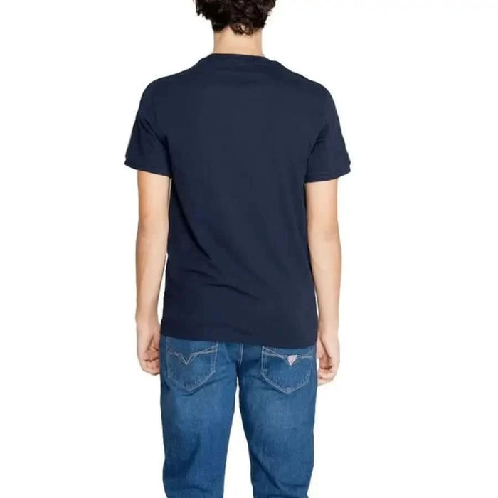 Navy blue short-sleeved Emporio Armani Men T-Shirt viewed from behind on a model