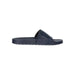 Emporio Armani women’s navy blue slide sandal with textured sole and brand logo on strap