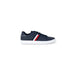 Navy blue Tommy Hilfiger men’s sneakers featuring red and white side stripes on a white sole