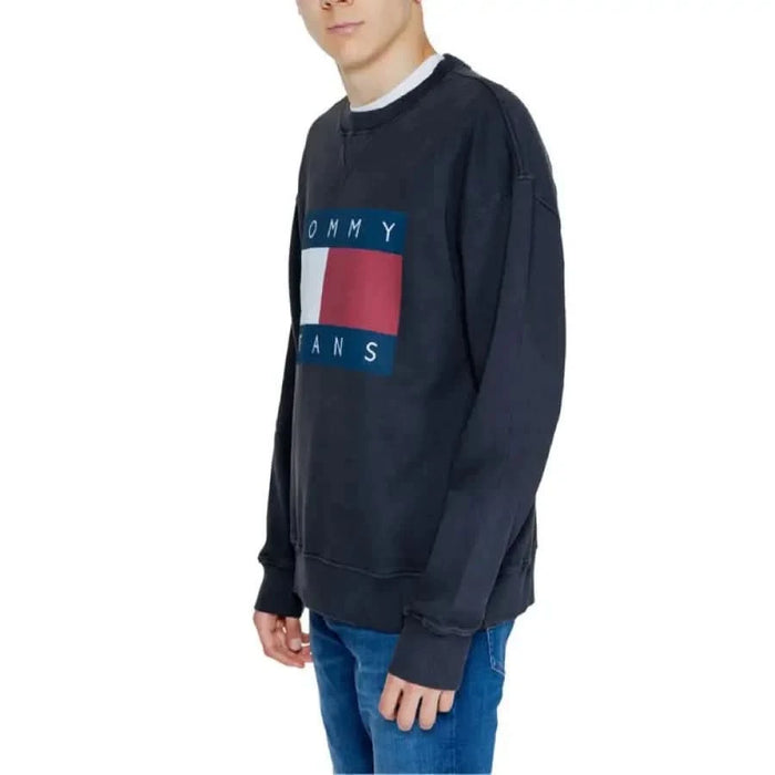 Navy blue Tommy Jeans sweatshirt with logo and iconic flag design on front