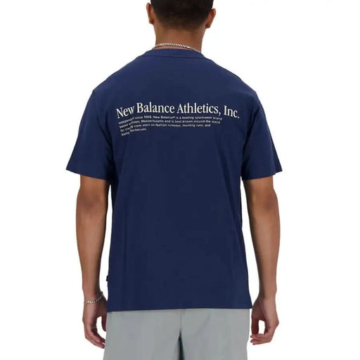 Navy blue New Balance Men T-Shirt with ’New Balance Athletics, Inc.’ printed on the back