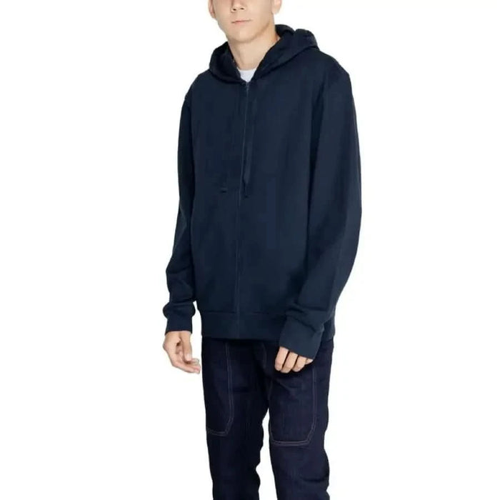 Navy blue zip-up hooded sweatshirt worn by model from Emporio Armani Underwear collection